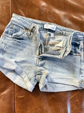 REGeneration by Celebrity Pink 5/27 light wash cut off distressed denim shorts